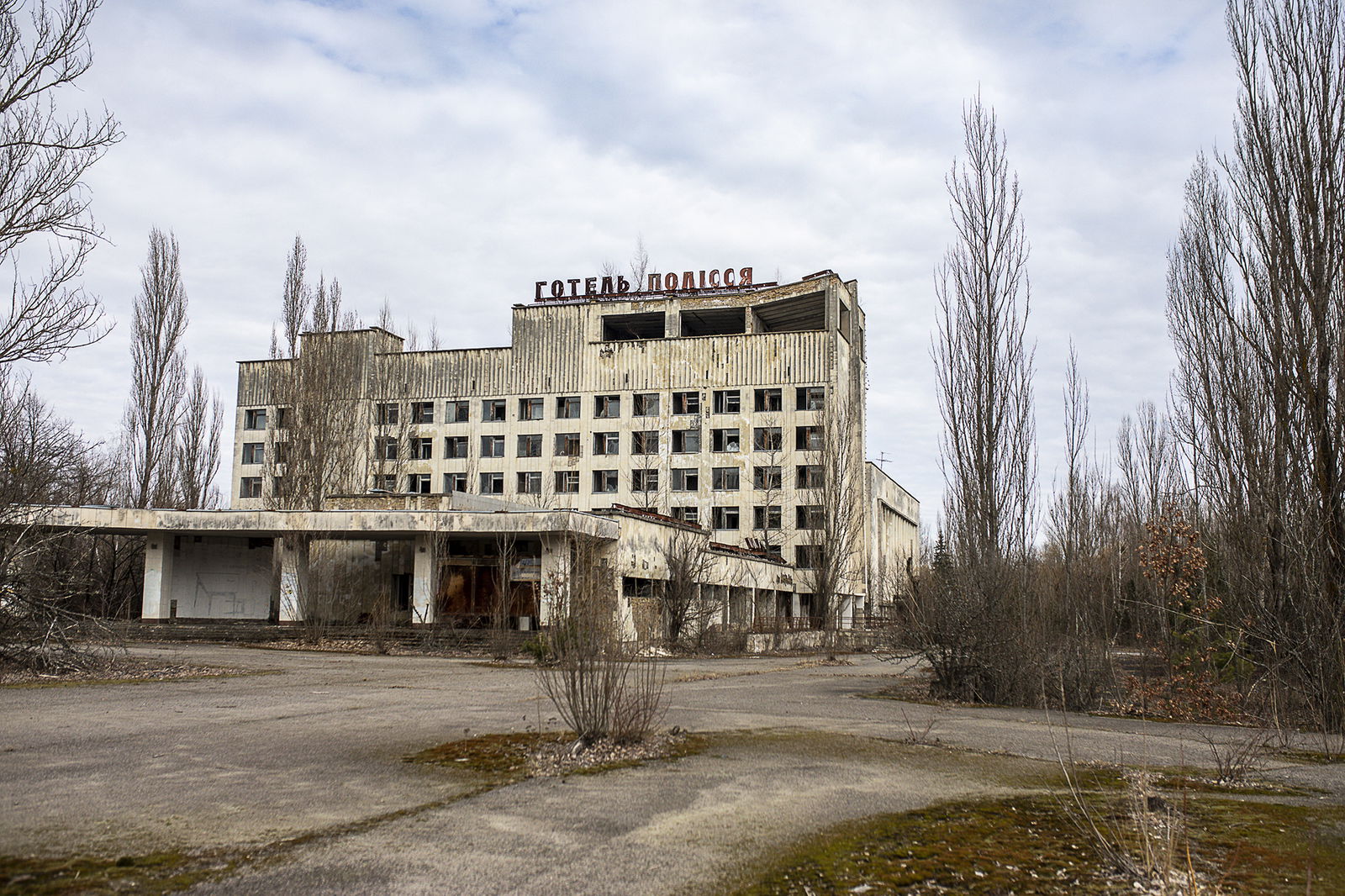 CHERNOBYL, UKRAINE - MARCH 17: A view of a damaged building as Ukrainian soldiers visit the 30-kilometer exclusion zone surrounding the Chernobyl nuclear power plant and the town of Pripyat where thousands of people who once worked at the nuclear power plant live, in Chernobyl, Ukraine on March 17, 2024. The traces of the explosion at the Chernobyl Nuclear Power Plant, the scene of the world's biggest nuclear disaster, still bear the traces of the explosion 38 years later. Pripyat, which was established in 1970 for Chernobyl Nuclear Power Plant workers and abandoned after the disaster, resembles a ghost town. While the accident that took place on April 26, 1986 at the plant 110 kilometers away from Kyiv, remains in the memories, the consequences of the accident are still being discussed on the international agenda. (Photo by Gian Marco Benedetto/Anadolu via Getty Images)